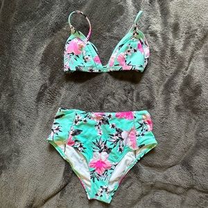 Tropical swimsuit with full coverage, high waisted bottoms and adjustable straps